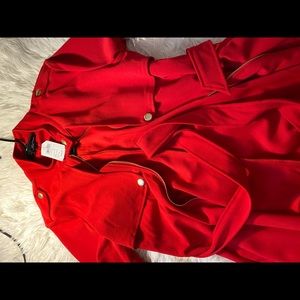 Red jacket in brand  new with tag